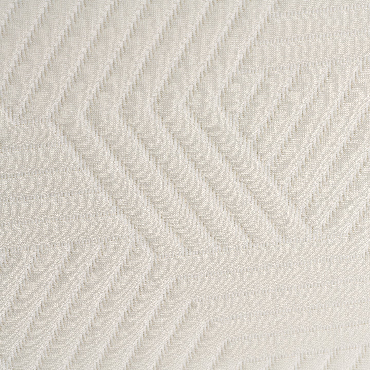Macro van de gestikte tijk van het SidePillow kussen